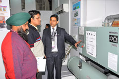 Eco-Products International Fair (EPIF) 2011  - Exhibition visitors learning more about Hitachi's products