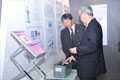 POWER-GEN India 2012 - Mr. Kinugawa being interested in the metal component display from Hitachi Metglas