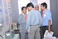 POWER-GEN India 2012 - Hitachi presenters explaining to visitors on Hitachi power-related components