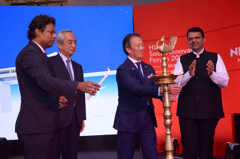 (L-R) Mr. M K Anand, Managing Director and CEO of Times Network, , His Excellency Mr. Kenji Hiramatsu, Ambassador of Japan to India, Mr. Kojin Nakakita, Managing Director, Hitachi India & Shri Devendra Fadnavis, Hon'ble Chief Minister of Maharashtra, Lighting the lamp at the Inauguration Ceremony of Hitachi Social Innovation Forum 2016